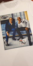 Load image into Gallery viewer, Americas Most Wanted | Nipsey | Tupac |Custom Cartoon | 80s Babies | The Real Shirt Plug ™